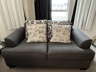 Love seat with cushions included