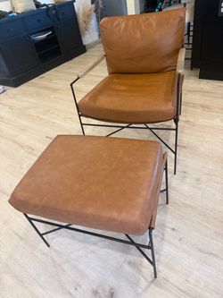 Modern faux leather chair and ottoman set