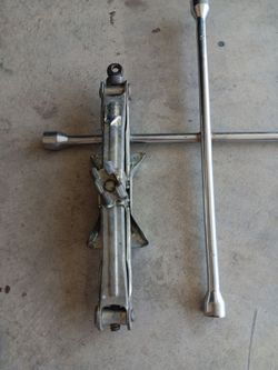 Car jack and tire iron