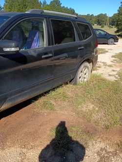 Black SUV with Roof Rails