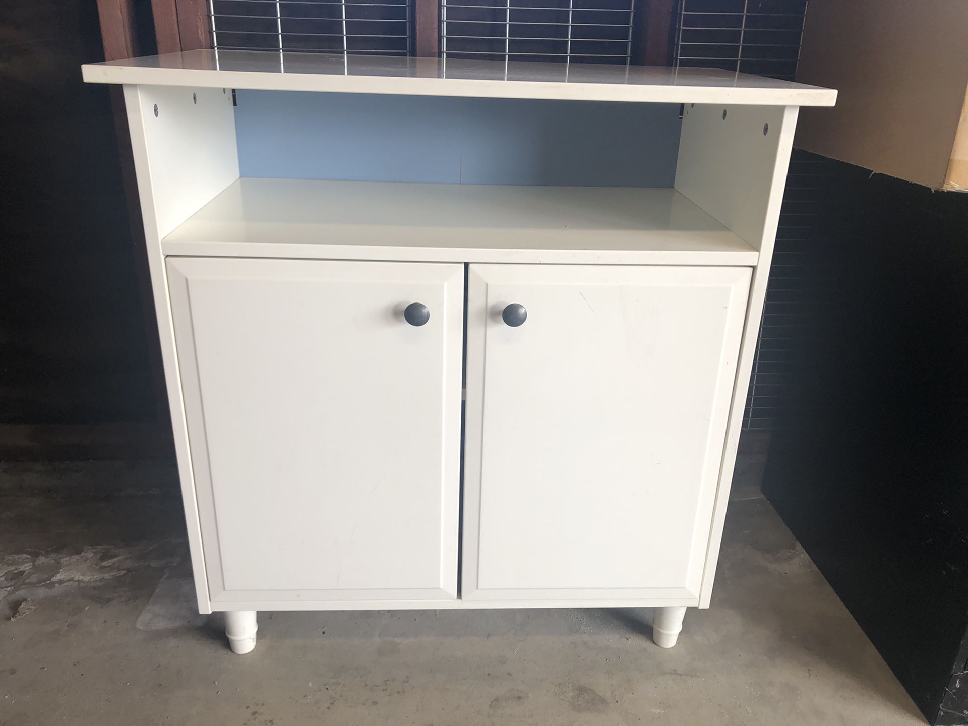 Small cabinet with shelves and doors