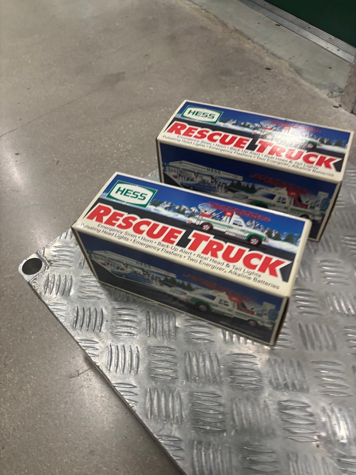 1994 Hess Rescue Truck- 2 collectible toy trucks released annually by Hess Corporation as part of a holiday tradition.. brand new in the original box