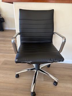 Black office chair chrome hardware