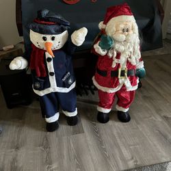 Santa And Snow Man Stuffed Figures