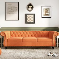 Orange chesterfield sofa