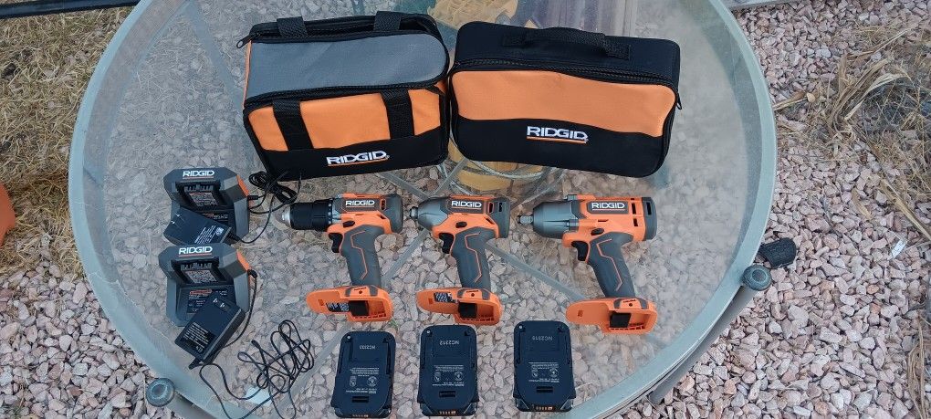 4 PIECE RIDGID TOOL KIT.
3 BATTERIES.
2 CHARGERS.