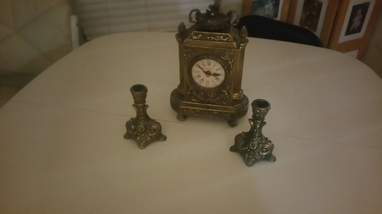 Clock and candle holders