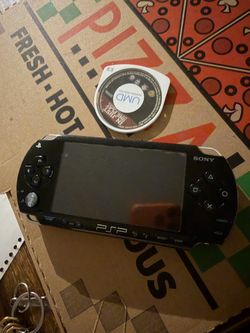 Sony PSP Handheld Console with UMD Game