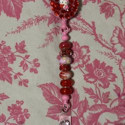 Hello Kitty Red Gems Badge Reel 