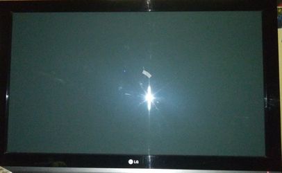 LG FLAT SCREEN T.V WITH OUT REMOTE