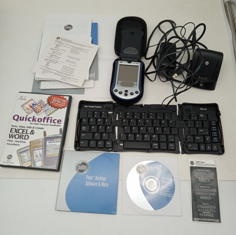 Palm M130. Palm. Palm Pilot. Keyboard. Dock
