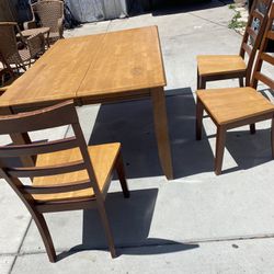 Table & 5 Chairs In Very Good Condition & Bry Strong 