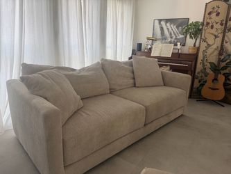 Large Beige Fabric Sofa with Cushions