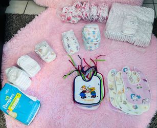 Diapers and bibs never been used new