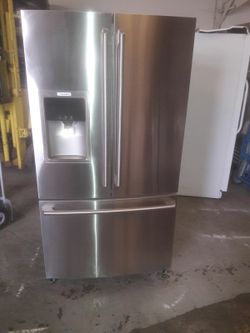 Refrigerator brand Electrolux measures 36 wide and 70 high 3 months warranty delivery and installation