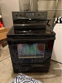Whirlpool black range top glass stove