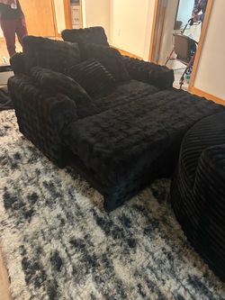Love seat and a swivel black