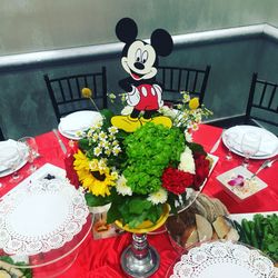Mickey and Minnie Mouse centerpieces with hand painted pots