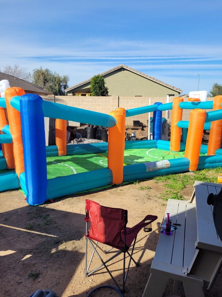 Little Tikes Huge 24' L x 12'W x 7
H Inflatable Sports Bouncer with
Backyard Soccer & Basketball
Court and Blower, Fits up to 8 Kids,
Outdoor Backyard