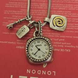 Slightly used silver necklace with a Watch