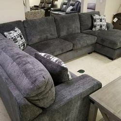 Ballinasloe Smoke  Sectional
Chaise: 39"W x 60"D x 39"H - 96lbs
Loveseat: 64"W x 38"D x 39"H - 87lbs.
Sofa: 92"W x 38"D x 39"H - 140lbs