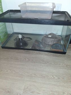 Fish tank and dog cage. 50.00