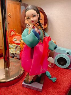 Vintage Korean doll wearing traditional Hanbok