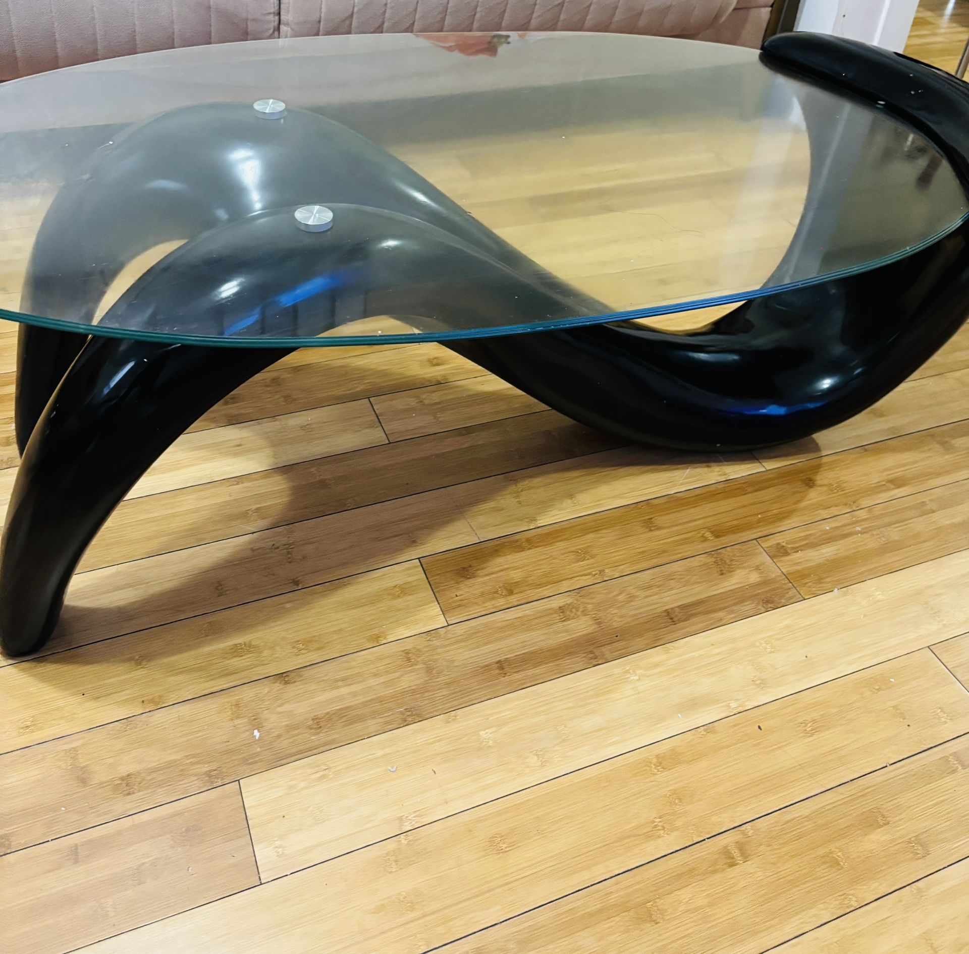 Artistic Black Coffee Table with Clear Glass Top