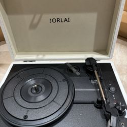 New Record player 3 speed turntable with bluetooth, built in battery stereo speakers. portable suitcase by Jorlai  