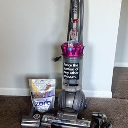 Dyson D65 animal complete vaccum in Fuchsia- used 3-4 time- paid $500 -throughly cleaned & sanitized