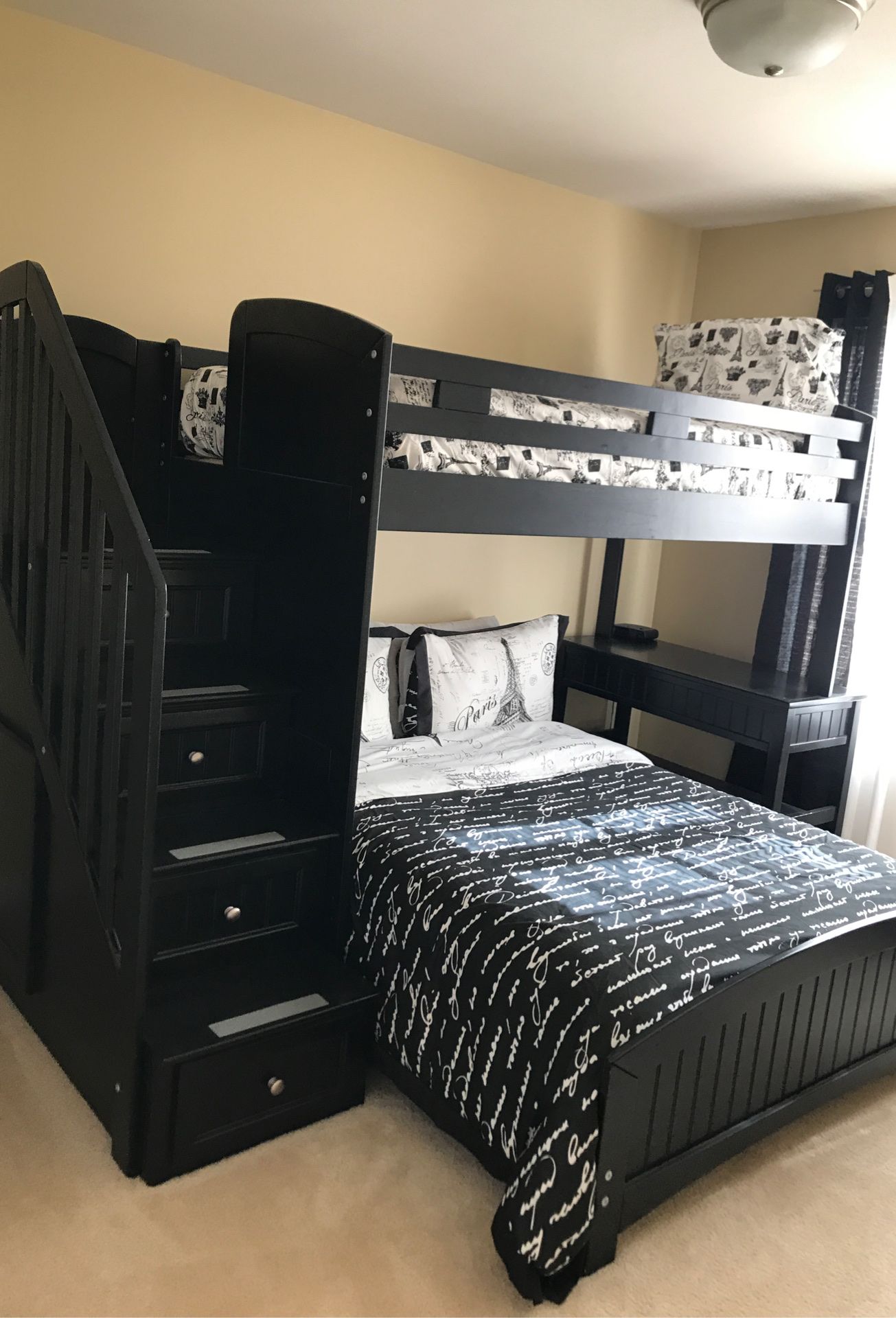 Bunk bed, with storage, and swivel chair, includes 4 drawers in steps for clothing storage. $899