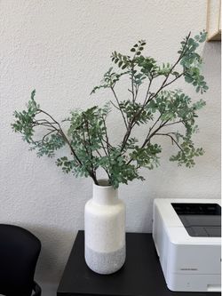 Fake plant with vase