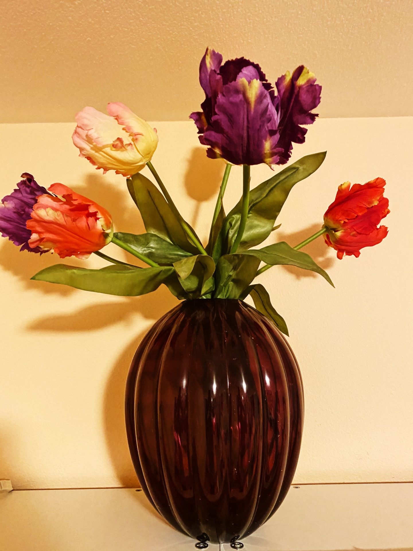 Purple Vase filled with fake Tulips