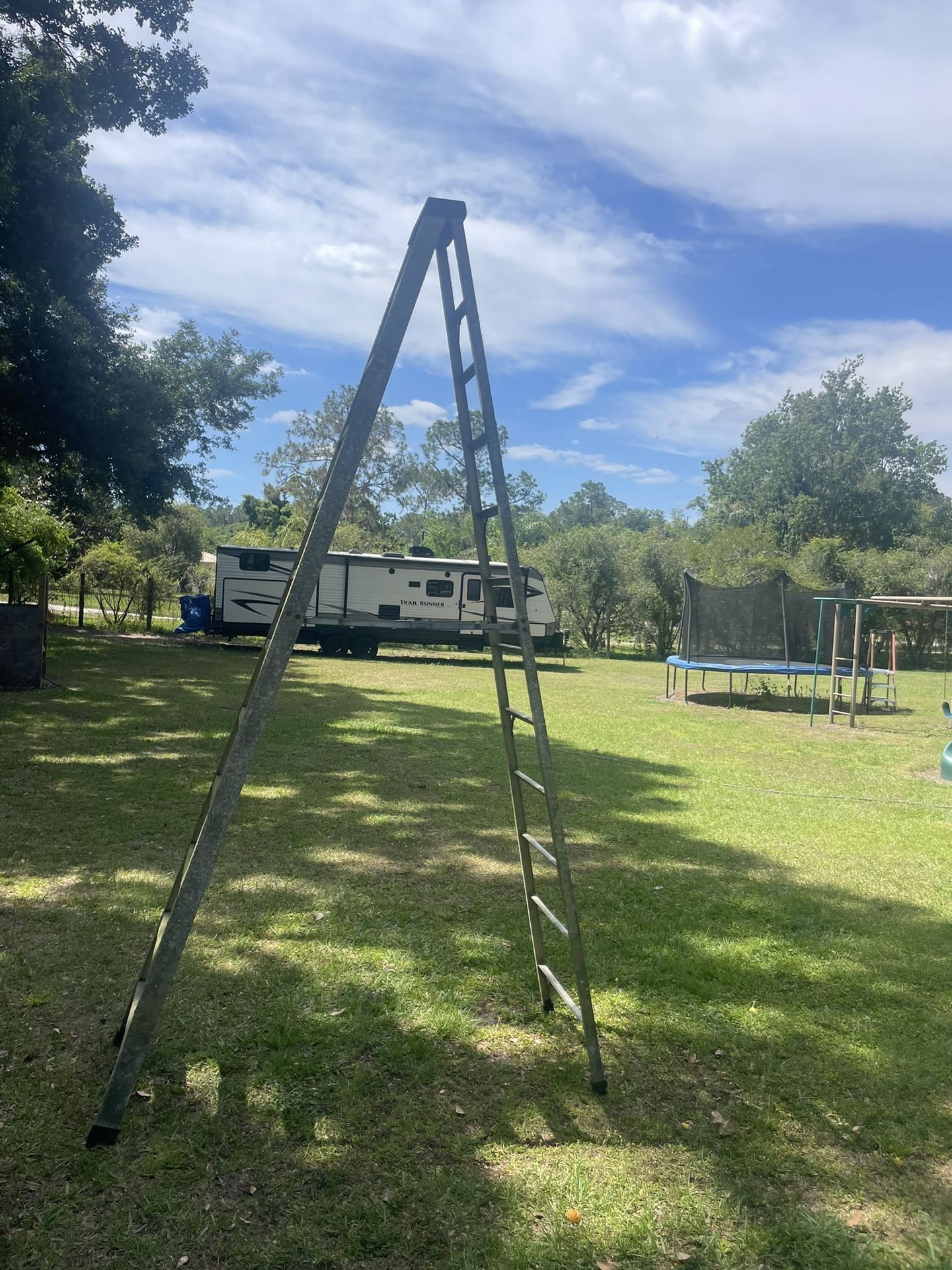 12 foot A-frame fiberglass ladder used needs cleaning $120 in n Lakeland 