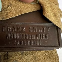 vintage Franz Swaty barber hone, manufactured in Austria.  In original leather skin holder