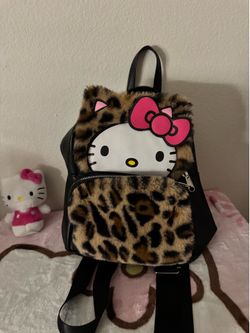 hello kitty backpack, with cheetah print