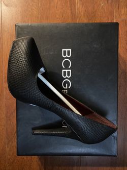 Black snakeskin style heels