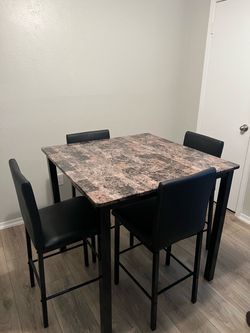 Furniture table with four chair