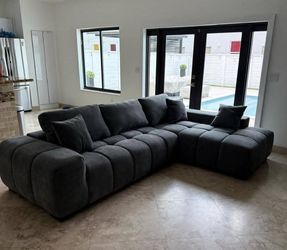 Beautiful, modern sectional sofa. Brand new. Perfect for your living room. Inquire for price.