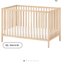 IKEA wood crib minimalist with mattress
