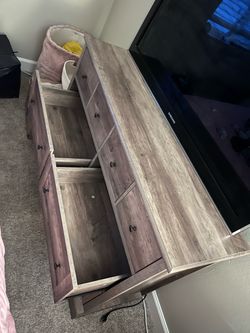 Rustic Wood Dresser with Multiple Drawers