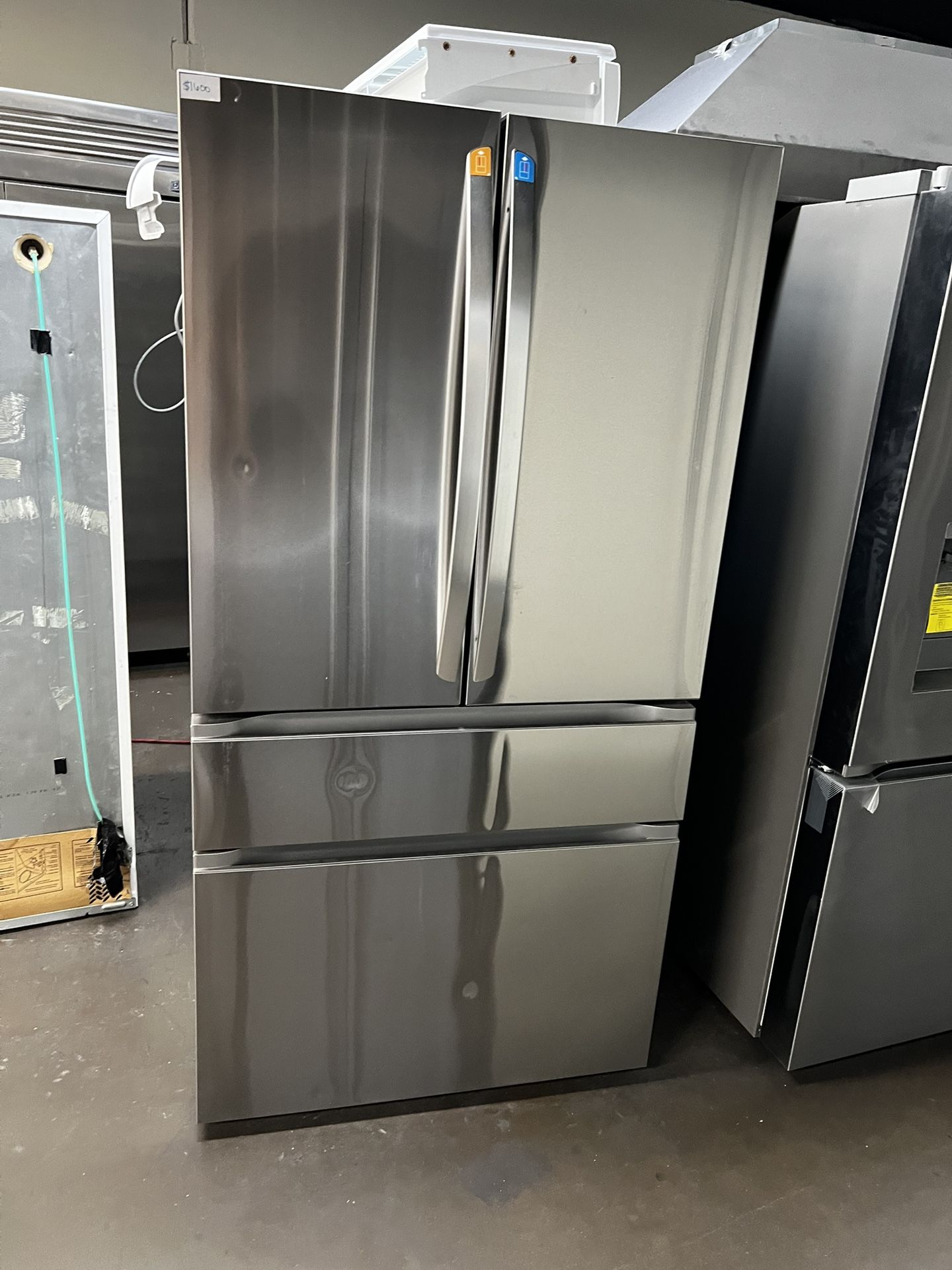 New Open Box Lg Four Door Stainless Steel Refrigerator With Internal Water/Ice 