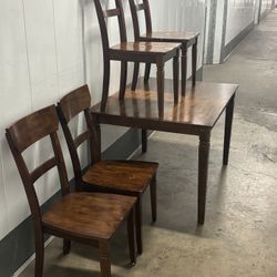 Solid wood table set Comes with the table and 4 chairs