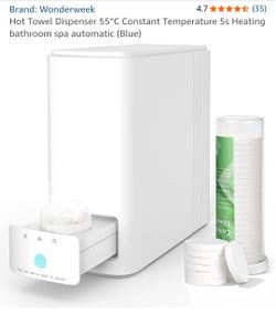 Hot towel warming dispenser