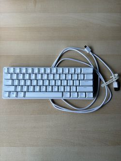 Razer Huntsman Mini 60% Mechanical Gaming Keyboard: Fast Keyboard Switches - Clicky Optical Switches - Chroma RGB Lighting - PBT Keycaps - Onboard Mem