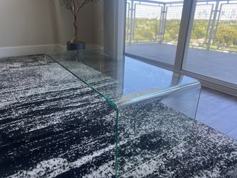 Modern waterfall-style glass coffee table