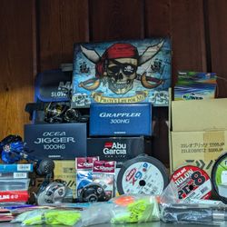 Lots Of Fishing Reels, Braid, And Slow Pitch Jigs