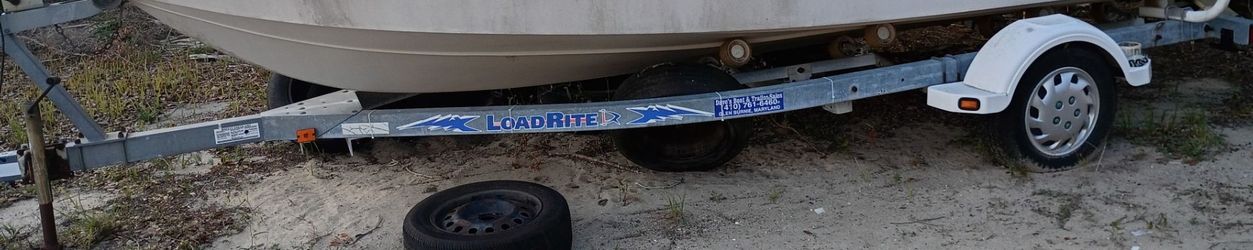 Boat trailer with free boat.