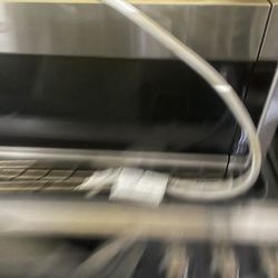 Square microwave sits over stove or anywhere you like