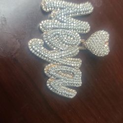 Custome 10k gold charm with real diamonds ( 29 grams)